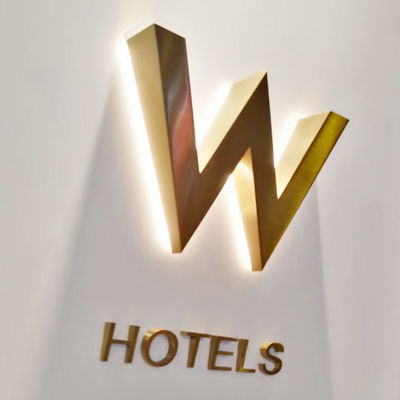 Letras de canal LED con retroiluminación de acero inoxidable 3D Logotipo de señal de luz metálica para señalización de hoteles